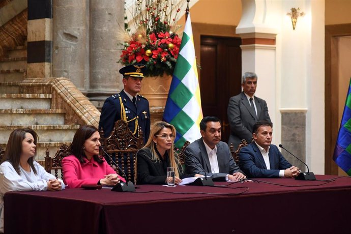 30 December 2019, Bolivia, La Paz: Jeanine Anez (C), interim president of Bolivia, announces the expulsion of several diplomats from Mexico and Spain in an escalation of a diplomatic row. Photo: Reynaldo Zaconeta Caballero/ABI/dpa