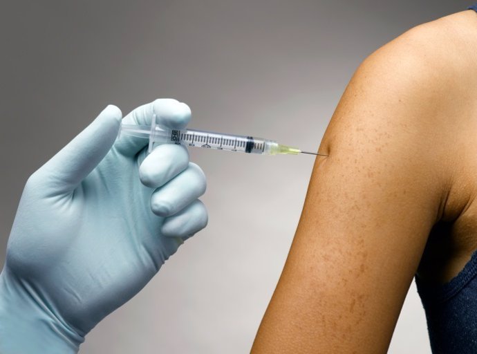 Person receiving a vaccine