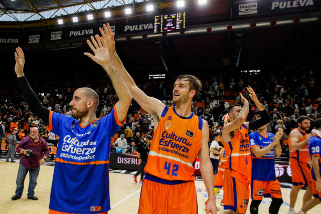 Quino Colom of Valencia Basket  celebrate victori whit team mates during Liga Endesaa. Regular Season Round 22 match between. Valencia Basket and San Pablo Burgos  played at  Fuente de San Luis Pavilion. In Valencia, Espain. March 1. 2020.