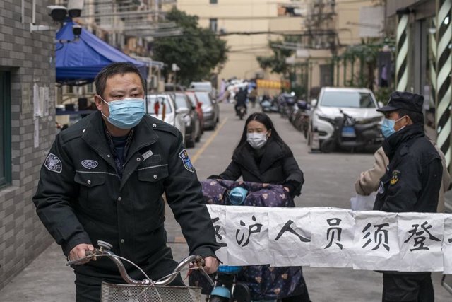 March 3, 2020, Shanghai China - Entrance to a residential compound, which is screening those who enter for signs of the coronavirus. According to official figures more than 93,000 people have been infected with the virus and at least 3,100 people have die
