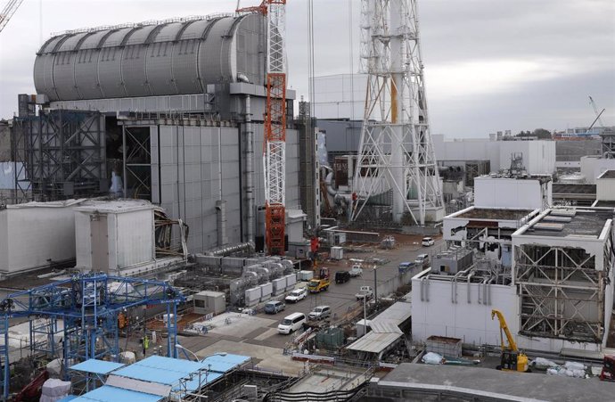22 January 2020, Japan, Okuma: Unit 3 (L) and Unit 4 (C-Rear) reactor houses are seen at tsunami-devastated Tokyo Electric Power Company (TEPCO) Fukushima Daiichi Nuclear Power Plant. Photo: Kimimasa Mayama/POOL/dpa
