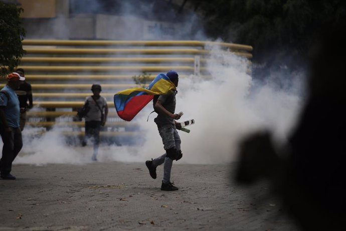 Disturbios en una marcha opositora por Caracas