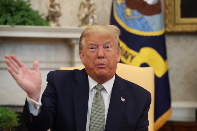 12 March 2020, US, Washington: US President Donald Trump speaks during a meeting with Irish Prime Minister Leo Varadkar (not pictured) in the Oval Office at the White House, as part of his visit to the US. Photo: Niall Carson/PA Wire/dpa