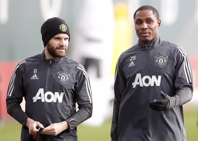 11 March 2020, England, Manchester: Manchester United's Juan Mata (L) and Odion Ighalo take part in a training session at the AON Training Complex, ahead of Thursday's UEFA Europa League Round of 16 first leg against LASK. Photo: Martin Rickett/PA Wire/
