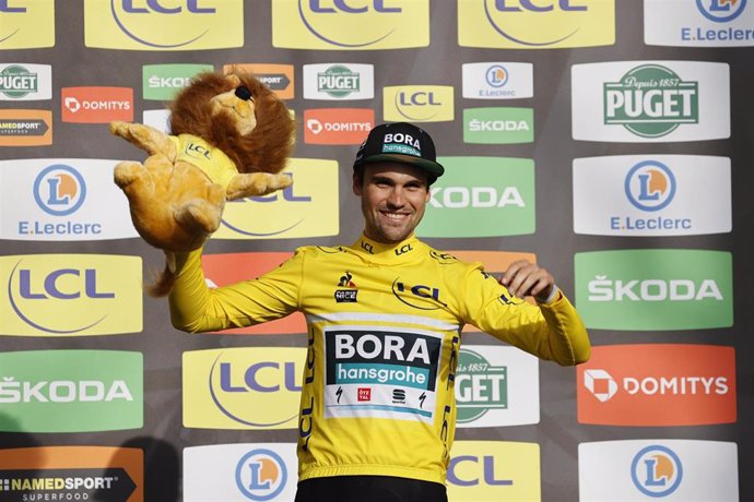 12 March 2020, France, La Cote-Saint-Andre: German cyclist Maximilian Schachmann of Bora-Hansgrohe celebrates finishing as Leader in the general ranking after the end of the fifth stage of the 78th edition of the 2020 Paris-Nice