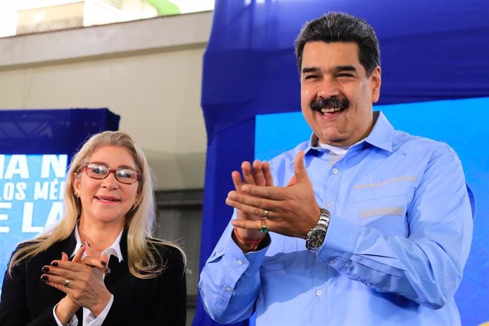 El presidente de Venezuela, Nicolás Maduro, junto a su mujer, Cilia Flores