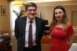 El ministro de Inclusión, Seguridad Socail y Migraciones, José Luis Escrivá, y la secretaria general de Uatae, María José Landaburu