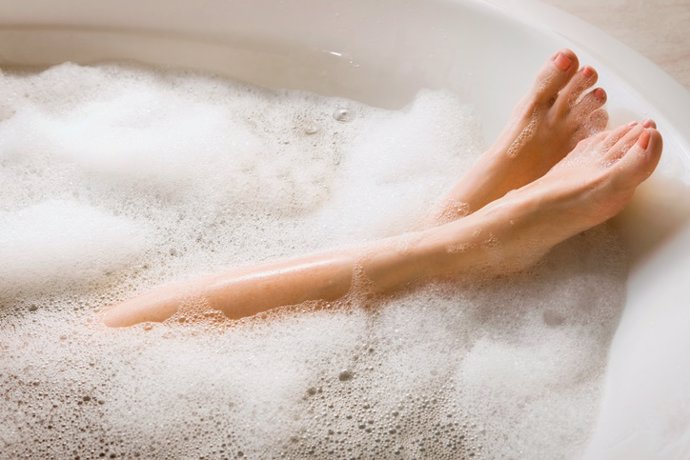 Woman's Legs & Feet in Bubble Bath