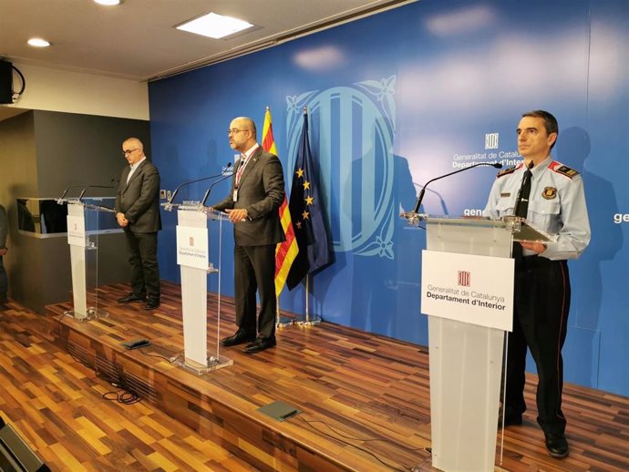 El conseller de Interior, Miquel Buch; el director del Servei Catal de Trnsit, Juli Gendrau, y el comisario general de los Mossos d'Esquadra Joan Carles Molinero.