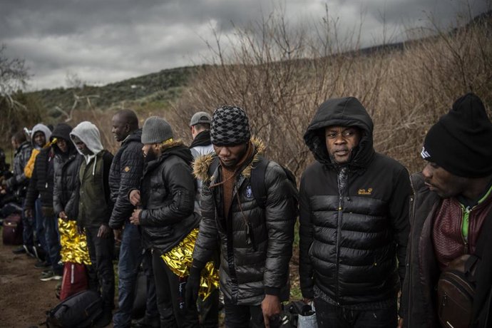 Migrantes y refugiados llegados a Lesbos desde Turquía