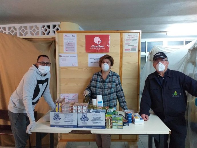 Imagen de voluntarios de Cáritas en El Algar