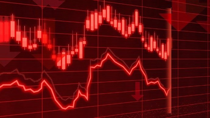 Mercado financiero en pérdidas mostrados en un panel bursátil en rojo