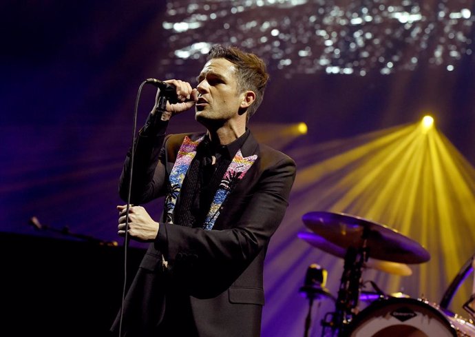 LAS VEGAS, NEVADA - APRIL 06:  Musician Brandon Flowers of The Killers performs onstage during the grand opening of T-Mobile Arena on April 6, 2016 in Las Vegas, Nevada.  (Photo by Kevin Winter/Getty Images for ABA)
