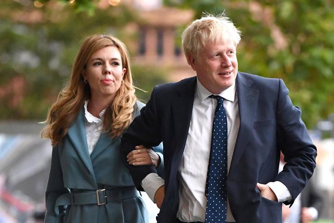British Prime Minister Boris Johnson And His Girlfriend Carrie Symonds Arrive At The Conservative Party Conference