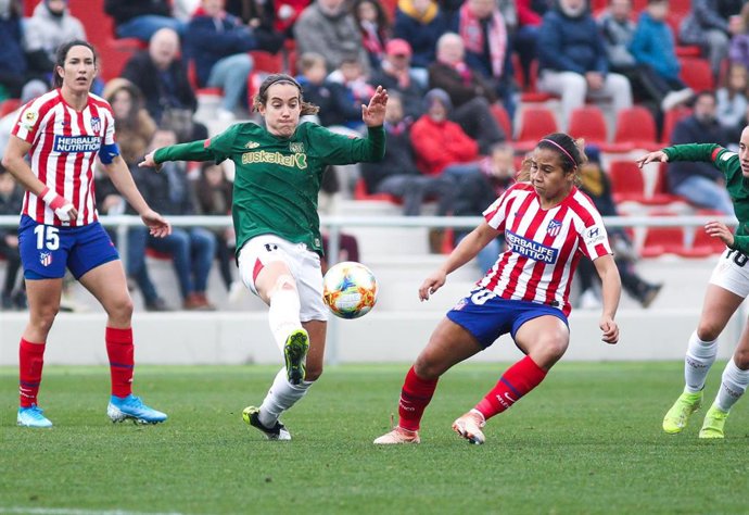Leicy Santos, of Atletico de Madrid and Marta Unzue Urdaniz, of Athletic Club fight for the ball  during Spanish Women League football match,  played between Atletico de Madrid Femenino and Athletic Club Femenino at Sport Center Wanda on December 08, 20