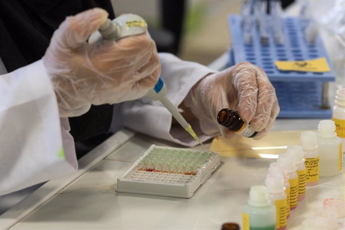 April 11, 2020 - Tehran, Iran: A lab technician is working on a coronavirus testing kit at a company that just added a production line during the outbreak in a lab outside of Tehran, Iran. April 11, 2020  (Arash Khamooshi/Contacto)