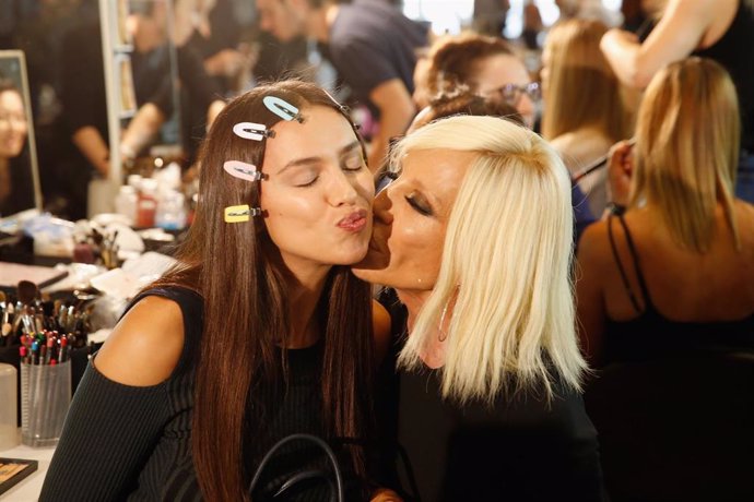 Model Irina Shayk (L) And Designer Donatella Versace Are Seen Backstage Ahead Of The Versace Show During Milan Fashion Week Spring/Summer