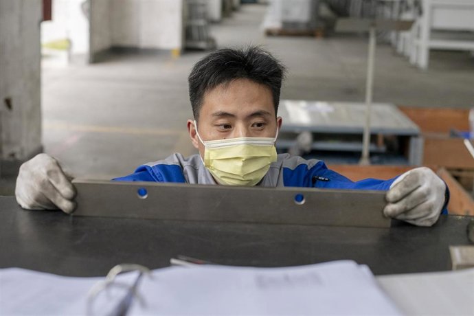 Un trabajador de una empresa alemana ubicada en Shanghai.