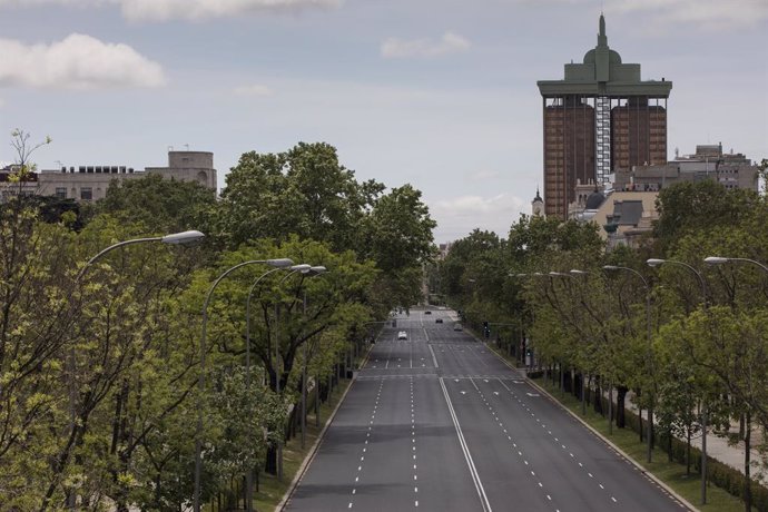 01 May 2020, Spain, Madrid: A general view of Paseo de la Castellana as it appears deserted during the International Workers Day due to the spread of the coronavirus (COVID-19). Photo: Guillermo Gutierrez/SOPA Images via ZUMA Wire/dpa