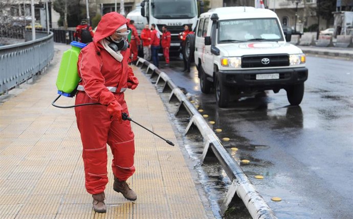 Desinfección de una calle en Damasco