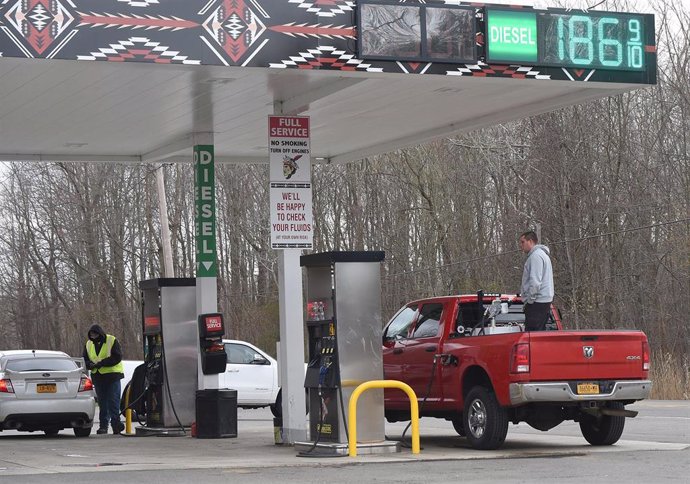 April 21, 2020 - Irving, New York USA: Western New Yorkers fill up their vehicles as well as auxiliary storage containers in Irving, New York just south of Buffalo. As the Covid 19 pandemic takes its toll on the economy so follows the oil market as the 