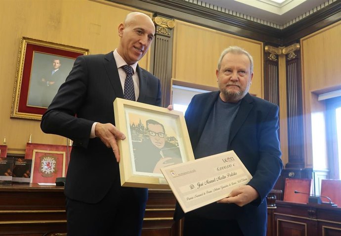 Enrega del premio de la pasda edición.