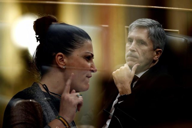 Multiexposición de la diputada de Vox Macarena Olona y el ministro del Interior, Fernando Grande-Marlaska, durante un pleno del Congreso
