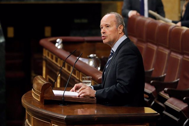 El ministro de Justicia, Juan Carlos Campo, durante su intervención en el debate de convalidación o derogación de los reales decretos-leyes.