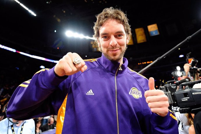 :  Pau Gasol #16 Of The Los Angeles Lakers Smiles After Receiving His Championship Ring
