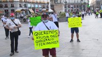 Los feriantes se concentran en Madrid reclamando estar "en alguna fase de la desescalada"