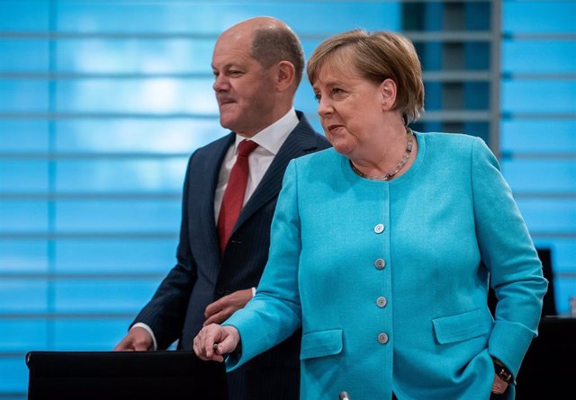 La canciller alemana, Angela Merkel, y el ministro de Economía de Alemania, Olaf Scholz. 