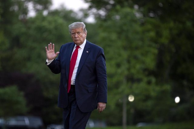 May 30, 2020 - Washington, DC USA:  U.S. President Donald Trump walks on the South Lawn of the White House in Washington, D.C., U.S., as he arrives from the Kennedy Space Center in Florida on Saturday, May 30, 2020. Trump vowed his administration would en