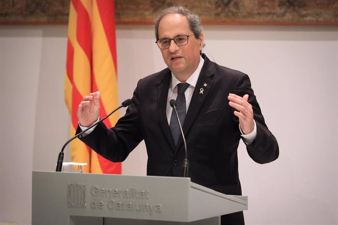 El presidente del Govern, Quim Torra, en rueda de prensa, en la que también ha participado el vicepresidente del Govern, Pere Aragons.