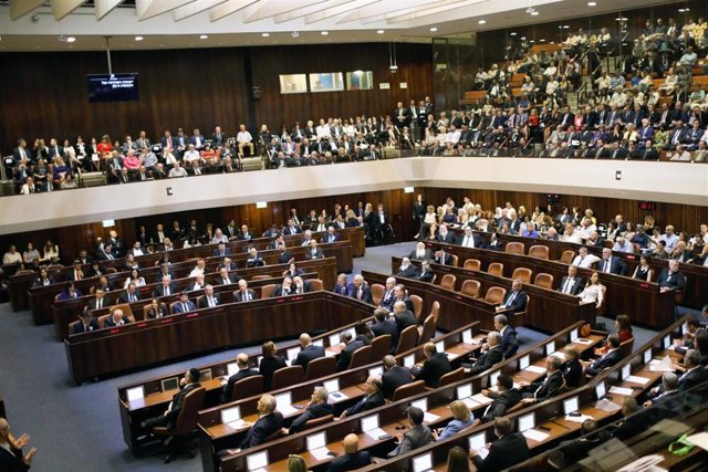 FILED - 03 October 2019, Israel, Jerusalem: A general view of the first session of the 22nd Israeli parliament (Knesset). Israeli parliamentary committee meetings were postponed on Thursday after a lawmaker was tested positive for the coronavirus, a Kness