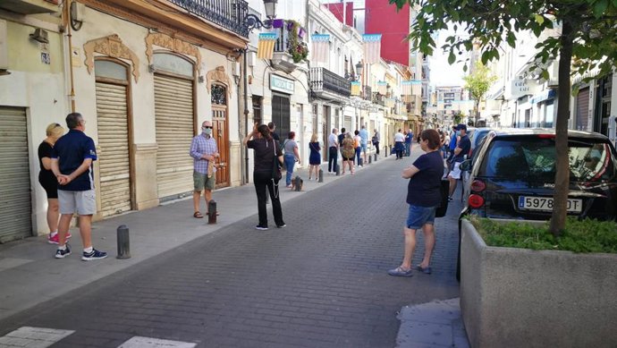 Fotografía de la exposición sobre la pandemia del coronavirus de Valenciaport