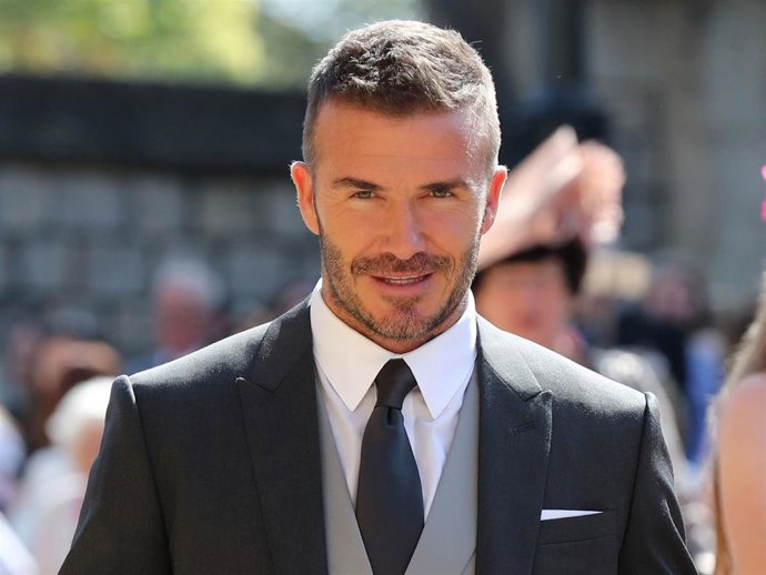 David Beckham arrives at St George's Chapel at Windsor Castle before the wedding of Prince Harry to Meghan Markle on May 19, 2018 in Windsor, England.