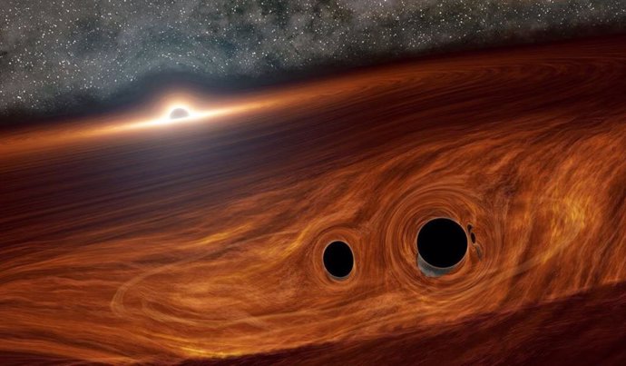 Las colisiones de agujeros negros pueden explotar con luz