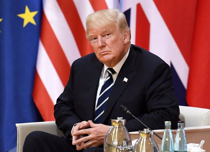 FILED - 07 July 2017, Hamburg: US President Donald Trump attends a meeting on the sidelines of the G20 summit. US President Donald Trump said late Friday he was rescheduling his first major public campaign event after a backlash over his chosen date, wh