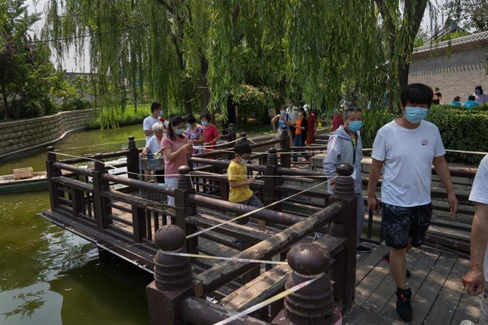 China asegura que el último repunte está controlado y prevé que en la próxima semana no se produzcan nuevos contagios en Pekín relacionados con el foco principal, un mercado mayorista del suroeste de la capital.