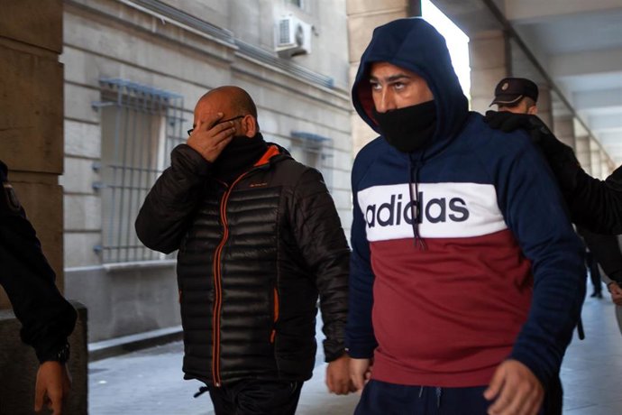 Acusados del triple crimen de Dos Hermanas en una de sus conducciones a los juzgados 