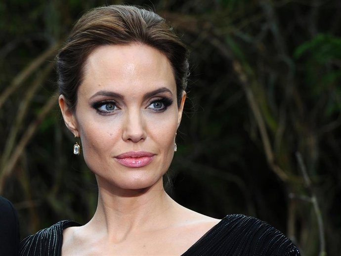 Angelina Jolie attends a private reception as costumes and props from Disney's "Maleficent" are exhibited in support of Great Ormond Street Hospital at Kensington Palace on May 8, 2014 in London, England.