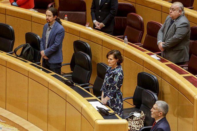 El vicepresidente segundo del Gobierno y ministro de Derechos Sociales y Agenda 2030, Pablo Iglesias; la vicepresidenta primera del Gobierno, Carmen Calvo; y el ministro del Interior, Fernando Grande-Marlaska.