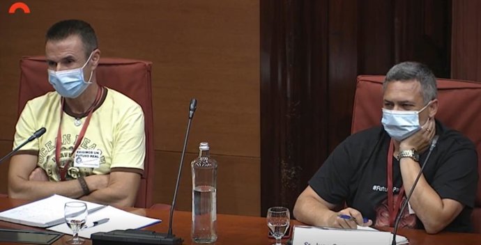 El secretario general de Sigen-Usoc en Nissan, Miguel Ruiz, y el presidente del comité de empresa de Nissan, Juan Carlos Vicente, este lunes en el Parlament.