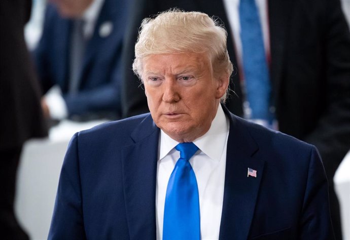 FILED - 29 June 2019, Japan, Osaka: US President Donald Trump arrives to attend the third working session of the G20 summit. Trump said he will fight to protect the American "way of life"that started when Italian explorer Christopher Columbus "discover