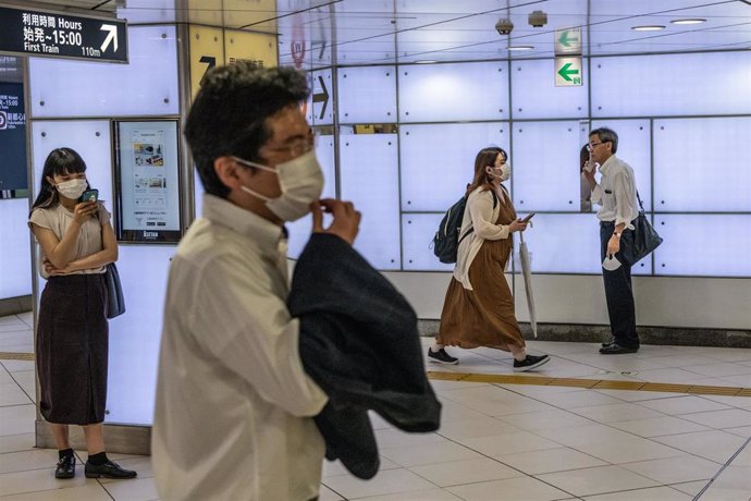 Personas con mascarilla en Tokio