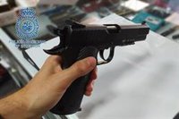 Detenidos los tres autores de dos atracos con arma de fuego en comercios de Sevilla