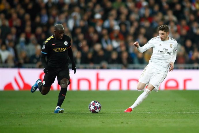 Benjamin Mendy of Manchester City and Federico Valverde of Real Madrid in action during the UEFA Champions League football match played between Real Madrid and Manchester City at Santiago Bernabeu stadium on January 26, 2020 in Madrid, Spain.