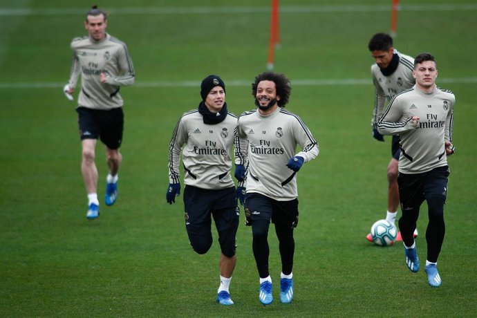 James Rodriguez y Marcelo corren juntos en un entrenamiento del Real Madrid