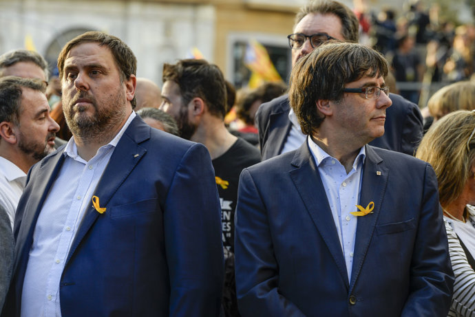 El líder de ERC y exvicepresidente de la Generalitat, Oriol Junqueras y el expresident catalán Carles Puigdemont