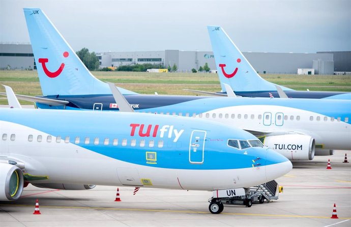 FILED - 15 June 2020, Lower Saxony, Langenhagen: Aircraft belonging to the airline TUIfly park at Hannover Airport. Photo: Hauke-Christian Dittrich/dpa